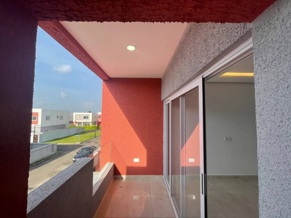 A building with a wall and a stairway